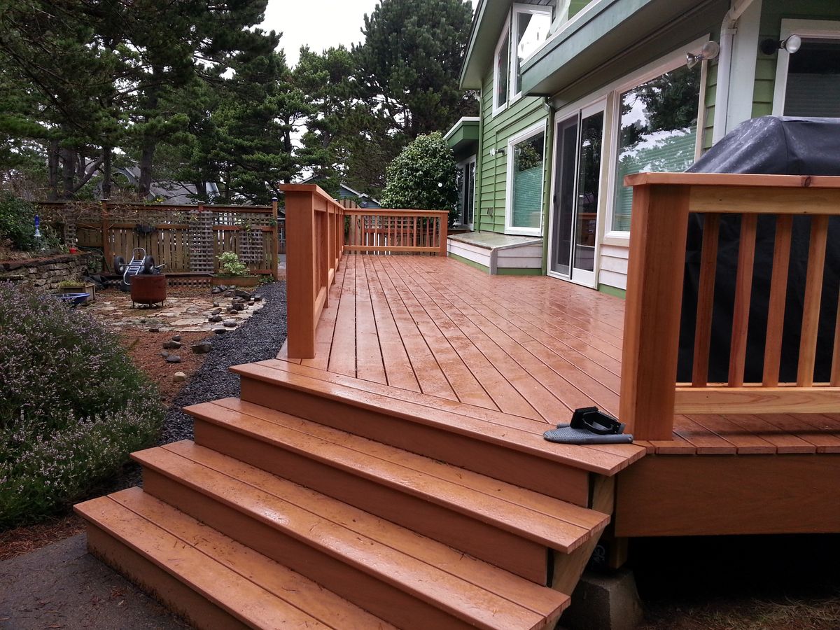 Custom cedar fence for coastal wind resistance