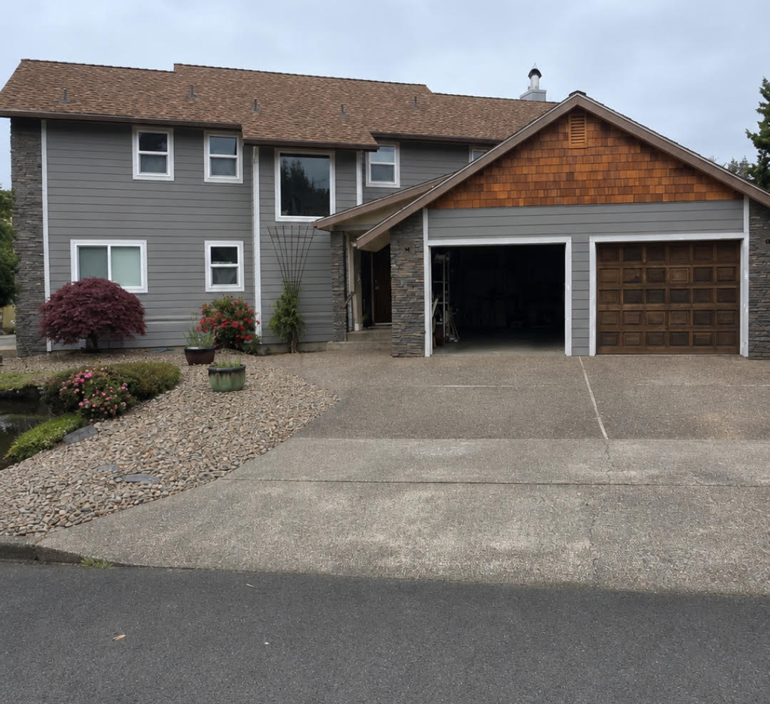 Siding repair on coastal Oregon home